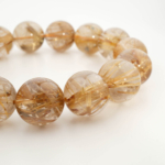 Bracelet de luxe orné de perles rondes de 15,60-15,61mm en quartz rutile doré foncé naturel original de qualité 10A+ VIP certifié.
