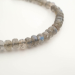 A delicate designer bracelet featuring original 3.5-5.5mm 6A+ grade faceted labradorite rondelle beads set in 925 sterling silver.