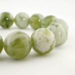Bracelet de prestige orné de perles rondes de 16-17mm en serpentine verte naturelle originale de qualité 5A+.