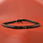 Bracelet tennis de luxe en argent sterling 925 plaqué noir orné de pierres d'onyx noir originales coupe carrée.