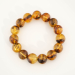 Bracciale di design ornato con sfere da 14-15mm di gema di ambra baltica originale certificata.