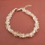 A luxury statement bracelet featuring original raw double-terminated Herkimer diamond quartz with golden inclusions and a 925 sterling silver clasp.