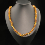 Collana da adulto in ambra baltica naturale originale certificata da 13-15g con grani color miele.