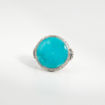 A 925 sterling silver handmade men's ring featuring a natural round cut Arizona blue turquoise gemstone.