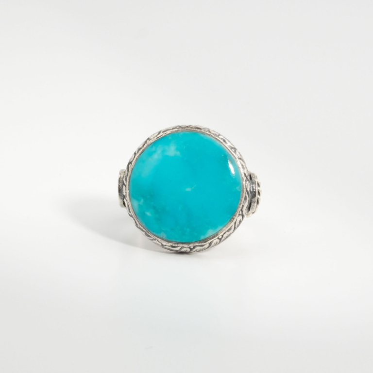 A 925 sterling silver handmade men's ring featuring a natural round cut Arizona blue turquoise gemstone.