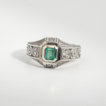 A 925 sterling silver handmade unisex ring featuring a natural square cut Zambian emerald gemstone.