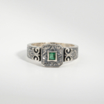 A 925 sterling silver handmade unisex ring featuring a natural square cut Zambian emerald gemstone.
