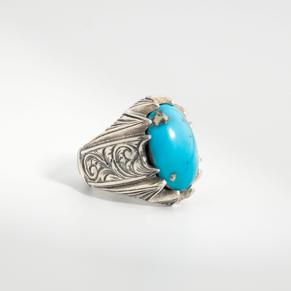 Bague pour homme faite main en argent 925 sertie d'une turquoise naturelle de Nishapur taillée en cabochon avec paires griffe.