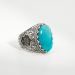 Bague pour homme faite main en argent 925 sertie d'une turquoise d'Arizona naturelle bleue taillée en cabochon.