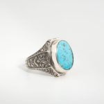 Bague pour homme faite main en argent 925 sertie d'une turquoise naturelle de Nishapur taillée en cabochon avec veine noire.