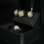 A natural rainbow cabochon opal and colorful tourmaline halo gemstone jewelry set in 925 sterling silver.