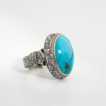 Bague pour homme faite main en argent 925 sertie d'une turquoise naturelle bleue taillée en cabochon.