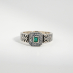 A 925 sterling silver handmade unisex ring featuring a natural square cut Zambian emerald gemstone.