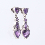 A pair of original heart cut amethyst natural stone 925 sterling silver dangle drop earrings with zircon accents.