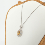 925 sterling silver women design necklace featuring an oval faceted natural yellow citrine in lace motif.