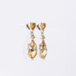 A pair of original heart cut citrine natural stone 925 sterling silver dangle drop earrings with zircon accents.