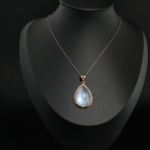 Pear cut natural cabochon moonstone women pendant necklace in rose gold plated 925 sterling silver.