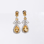 Pendientes colgantes en plata de ley 925 con citrino natural original en forma de gota y circonitas.