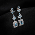 Pendientes colgantes en plata de ley 925 con topacio azul natural original corte baguette y pera.