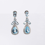 Boucles d'oreilles pendantes en argent 925 avec topaze bleue naturelle originale en forme de goutte et zircons.