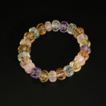 Bracelet extensible en pierres naturelles taillées en forme de melon (citrine, quartz rose, améthyste, fluorite).