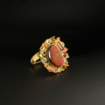 A 925 sterling silver gold-plated women's ring featuring a natural red-green ammonite opal gemstone surrounded by citrine, garnet, yellow sapphire, and green amethyst.