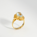 Bague pour femme en argent 925 doré sertie d'une topaze bleue naturelle taillée en facettes de 4,2 ct avec motif grec.