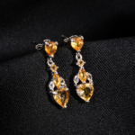 Pendientes colgantes en plata de ley 925 con citrino natural original corte corazón y circonitas.