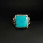 A 925 sterling silver handmade men's ring featuring a natural square cut Arizona blue turquoise gemstone.